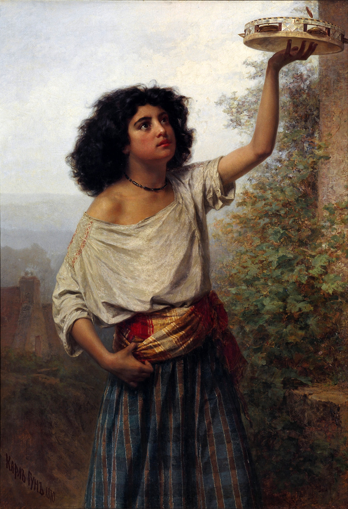 young gypsy woman with tambourine
